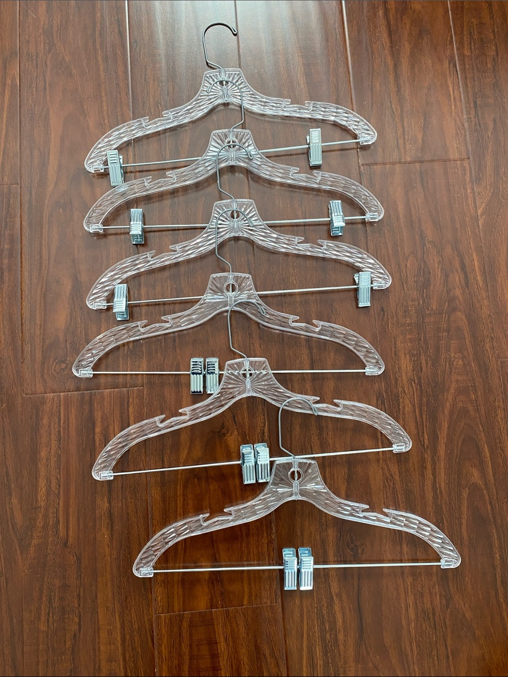 6 of new plastic hangers with clips